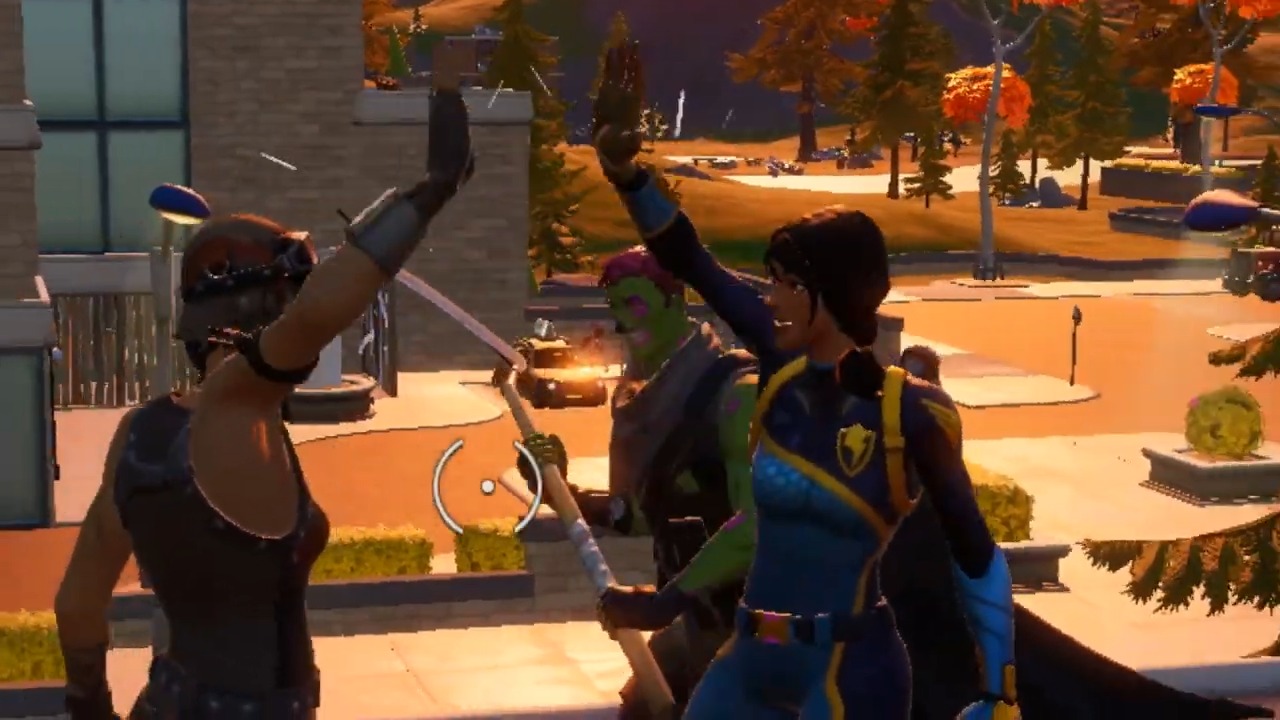 Players giving each other a high-five in Fortnite.